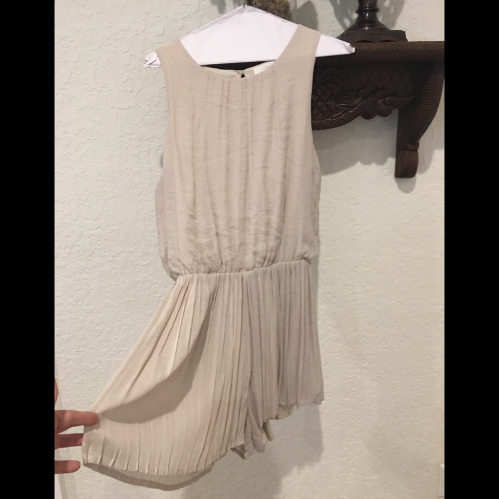 Tan romper never worn